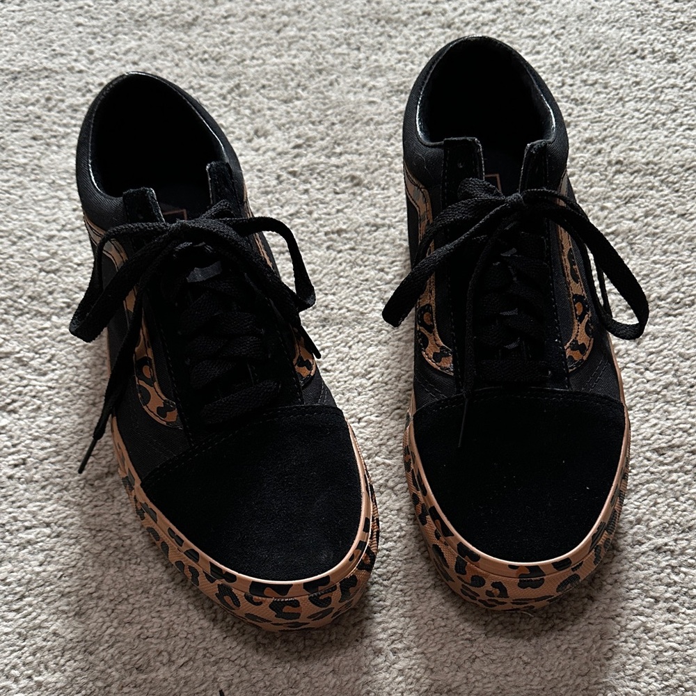 Leopard print and black platform Vans